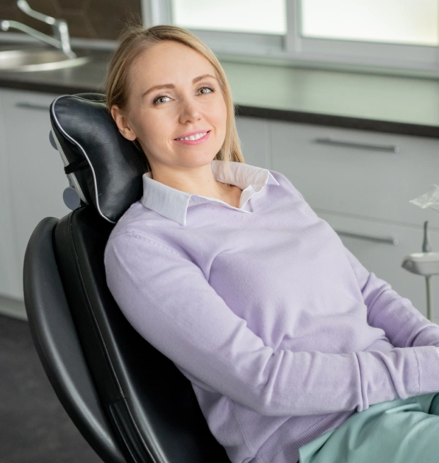 Patient relaxing comfortably in a dental chair