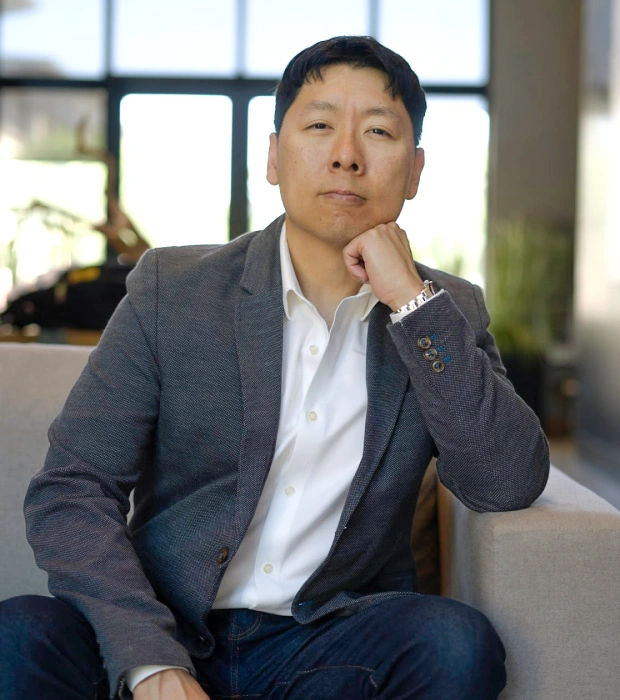 Dr. Daniel Kou smiling in the dental office