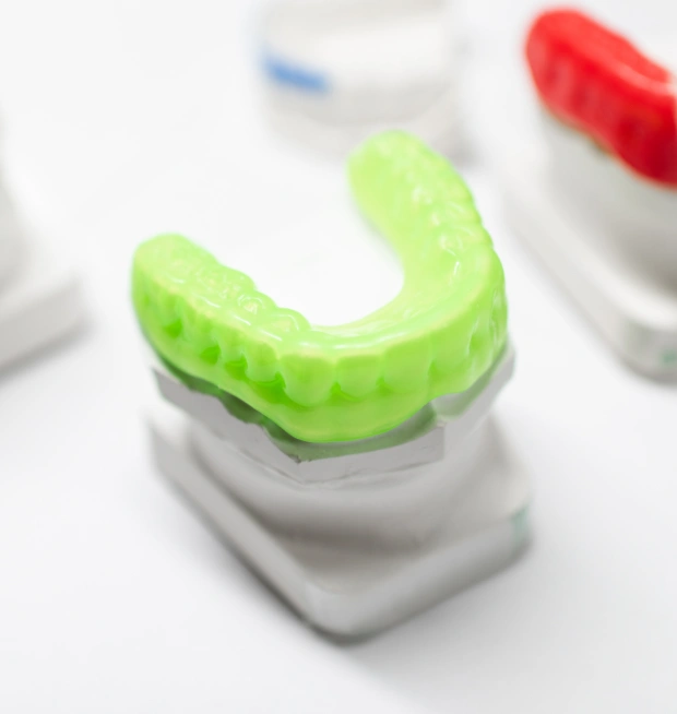 Custom dental mouth guards on display