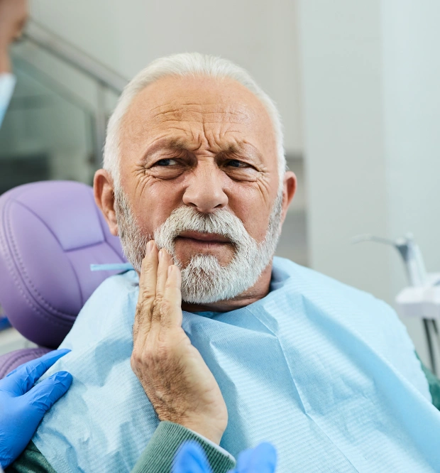 Senior patient after tooth extraction treatment